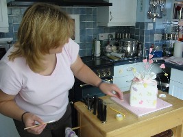 Anne Aspinall applying the finishing touches
